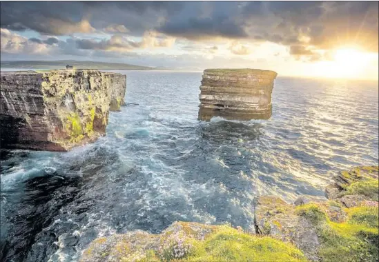  ?? Gareth Mccormack Getty Images ?? THE VIEW is dramatic at Downpatric­k Head in County Mayo, the handpicked spot for the loved ones’ ashes. But the windy site would present a challenge.