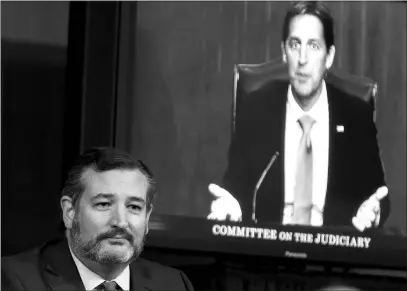  ?? SAMUEL CORUM / GETTY IMAGES FILE (2020) ?? Sen. Ted Cruz, R-texas, listens as Sen. Ben Sasse, R-neb., speaks Oct. 14 on Capitol Hill in Washington.