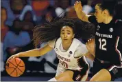  ?? PHOTO BY ELSA _ GETTY IMAGES ?? Haley Jones of the Stanford Cardinal drives against Brea Beal of South Carolina in Friday’s Cardinal victory.