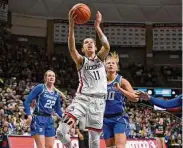  ?? Jessica Hill/Associated Press ?? UConn’s Lou Lopez Senechal shoots against Creighton during the second half on Wednesday in Storrs.