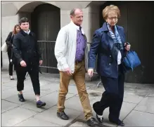  ??  ?? „ Mother Catherine Devallonne, left, and father Patrick Lionnet at court.