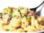  ?? SOUTH FLORIDA SUN SENTINEL CARLINE JEAN/ ?? Cavatappi with pancetta and peas from Coolinary and the Parched Pig restaurant in Palm Beach Gardens.
