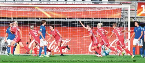  ?? — AFP ?? Russia’s Elena Morozova (2nd L) celebrates with teammates after scoring during the Uefa Women’s Euro 2017 tournament at Stadium Sparta Rotterdam.