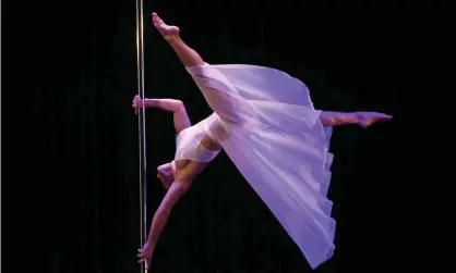  ??  ?? Candice Jabur competing at the US pole dancing championsh­ip in New York. Photograph: Timothy A. Clary/AFP/Getty Images