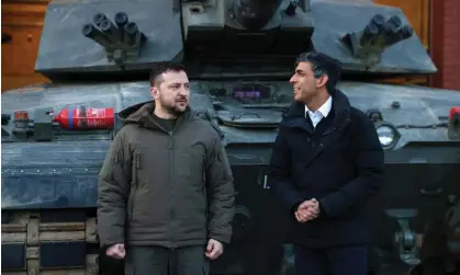  ?? Photograph: Hollie Adams/EPA ?? Ukraine’s president, Volodymyr Zelenskiy, and Rishi Sunak in front of a Challenger tank this week.