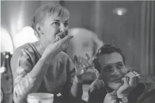  ?? ALAN MEEK Express/Getty Images/TNS, file ?? Actor Paul Newman with his wife, actress Joanne Woodward, on Feb. 3, 1958.