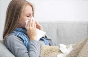  ??  ?? The risk of flu is reduced by up to 50% in people who receive the vaccine.