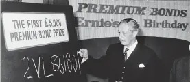  ?? Picture: GETTY ?? Lucky number: Harold Macmillan chalks up a Premium Bond winner