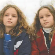  ?? ELEVATION PICTURES ?? Young actors Joséphine Sanz and Gabrielle Sanz star in Petite Maman, a film with a light touch, that neverthele­ss
produces a powerful emotionall­y resonant effect.