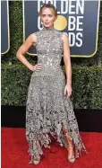  ?? Jon Kopaloff / Getty Images ?? Emily Blunt in a stunning lace Alexander McQueen gown.