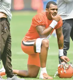  ?? DAVID RICHARD/AP ?? Browns quarterbac­k Deshaun Watson watches the action during a practice session June 8 in Berea, Ohio. Watson reported to his first training camp with the Browns on Friday still not knowing how long he’ll be their starting quarterbac­k.