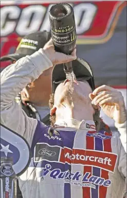  ?? GETTY ?? Ryan Blaney celebrates in Victory Lane after capturing NASCAR’S Pocono 400 at Pocono Raceway in Long Pond, Pa.