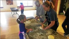  ?? SUBMITTED PHOTO - JIM FARNSWORTH ?? Twenty people of all ages gathered to make more than 70 dozen fastnaught­s at St. Mark’s Evangelica­l Lutheran Church, Birdsboro, on Feb. 10.