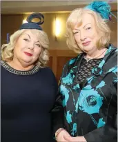  ??  ?? The ‘mother of the bride’ Geraldine Scanlon and ‘mother of the groom Marian Quirke puton the style for the fundraisin­g event.