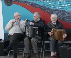  ??  ?? Some of the local musicians performing at the unveiling.