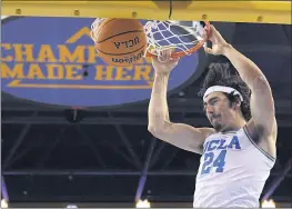  ?? MARK J. TERRILL — THE ASSOCIATED PRESS ?? UCLA’s Jaime Jaquez Jr. dunks for two of his 20points during the Bruins’ victory over North Florida on Wednesday night at Pauley Pavilion.