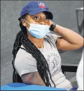  ?? The Associated Press ?? Rogelio V. Solis
Jniya Tallie, a graduate assistant with the Jackson State women’s basketball team, receives her second dose of the Pfizer vaccine July 27.