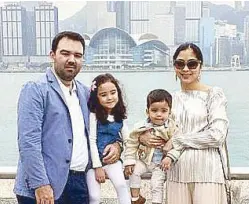 ??  ?? Ina Arabia-Garcia with husband Carlo and their kids during a trip to Hong Kong
