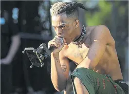  ??  ?? XXXTentaci­on. Otro asesinato más en la viña del hip hop.