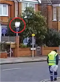  ??  ?? Terrifying: The chunk of ice, circled, hurtles towards the ground across the road from Serhiy Myeshkov. It hits the ground and shatters, making him look back in alarm