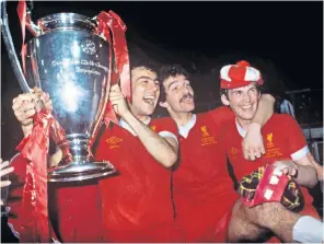  ?? ?? Great, but underrated: Liverpool’s Ray Kennedy, with Graeme Souness and the winning goalscorer Kenny Dalglish celebratin­g with the European Cup, 1978; right, Kennedy heads the ball past Nottingham Forest defender Viv Anderson at Anfield in 1980; and, below, Diana, Princess of Wales, greets Kennedy to promote Parkinson’s Disease Awareness Week in 1992