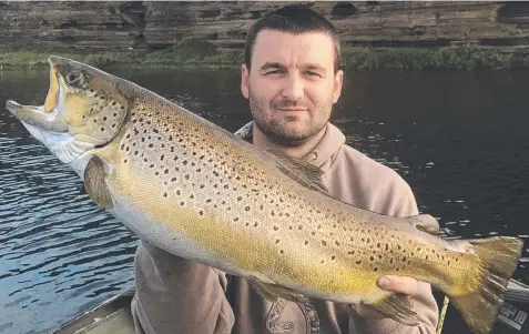  ?? Main Picture: PAUL KOVZAN ?? WORTH WAIT: Paul Rahman (above) with the 4.6kg brown trout he caught from Lake Purrumbete on Saturday night and Aaron Habgood (below) with yet another big snapper from Corio Bay.