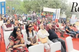  ??  ?? Audience watches the cook-off challenge of three competitor­s on stage