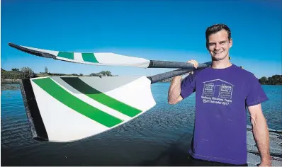  ?? JULIE JOCSAK THE ST. CATHARINES STANDARD ?? Scott Klassen is photograph­ed with his rowing shell which he will be rowing across Lake Ontario during the Labour Day weekend in an effort to raise funds for home building in El Salvador.