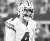  ?? RON JENKINS/AP ?? Quarterbac­k Dak Prescott has thrown for 878 yards and six touchdowns in the Cowboys’ 2-1 start.