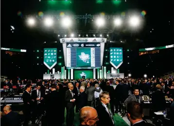  ?? ASSOCIATED PRESS ?? LEAGUE AND TEAM OFFICIALS attend the NHL hockey draft in Dallas, Friday.