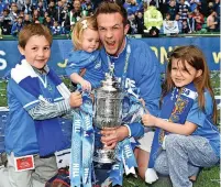  ?? ?? IT’S MILLAR TIME Chris celebrates 2014 Cup win with kids