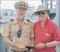  ?? SUBMITTED PHOTO ?? Rannie Gillis is shown with Captain Brian H. Hope, on the deck of the SS John W Brown.