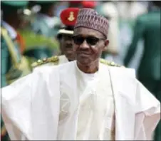  ?? SUNDAY ALAMBA - THE ASSOCIATED PRESS ?? In this 2015, photo, Nigerian President elect, Muhammadu Buhari, arrives for his inaugurati­on at the eagle square in Abuja, Nigeria. The Boko Haram extremist group has finally been crushed — driven from its last forest enclave with fighters on the run...