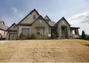  ?? [PHOTOS BY STEVE GOOCH, THE OKLAHOMAN] ?? Foster Signature Homes of Norman built this year’s St. Jude Dream Home at 8225 Ridge Creek Road in Edmond.