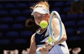  ?? Andy Brownbill / Associated Press ?? Barbora Krejcikova plays a backhand return in her win over Jelena Ostapenko.