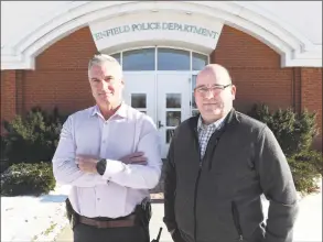  ?? Arnold Gold / Hearst Connecticu­t Media ?? Detective Rian Callaghan, left, and Detective Lt. Willie Pedemonti at the Enfield Police Department on Dec. 19, 2019.