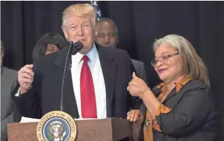  ?? GETTY IMAGES ?? President Donald Trump delivers remarks with Alveda King, niece of the Rev. Martin Luther King Jr., Tuesday after touring the Smithsonia­n National Museum of African American History and Culture.