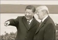  ?? GETTY IMAGES ?? Chinese President Xi Jinping and US President Donald Trump in Beijing, November 9. The trade war with China is an issue that predates Donald Trump’s presidency