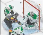  ?? Jason Franson The Associated Press ?? Golden Knights wing Reilly Smith is stopped on a scoring attempt by Dallas Stars goalkeeper Ben Bishop.