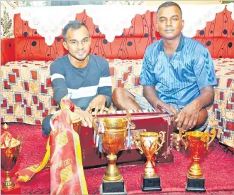  ?? Picture: BALJEET SINGH ?? Deepak Singh (left) with his father, Uday Singh, at Korovuto, Nadi.