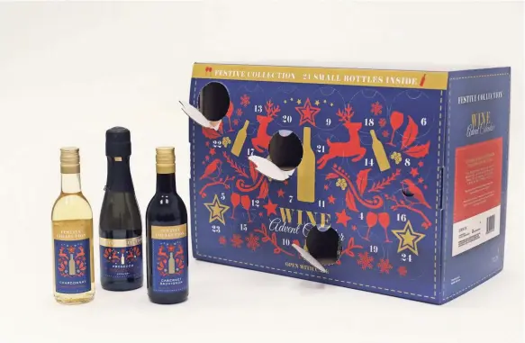  ??  ?? Aldi’s Wine Advent Calendar lets nostalgic adults sip, rather than nibble, away the days till Christmas. MARK LENNIHAN/AP