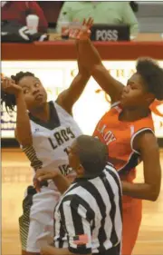  ?? Contribute­d by Gail Conner ?? Top: Quan Neal shoots against CentralCar­roll in the Region 5-AAA tournament. Above: Cedartown and Rockmart fought in their first game of the region tournament.