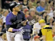  ?? ELISE AMENDOLA/ASSOCIATED PRESS FILE PHOTO ?? The Colorado Rockies’ Trevor Story hits a two-run homer against the Boston Red Sox in May in Boston. Fully healed from a midseason injury, he’s eager to prove his 27 homers in 97 games were no fluke.