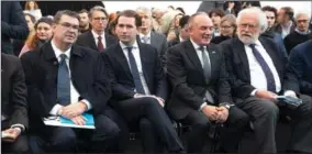  ?? (AP/Lisa Leutner) ?? Oskar Deutsch (from left), president of the Jewish Community of Vienna, sits next to former Austrian Chancellor Sebastian Kurz, the Israeli Ambassador of Austria Mordechai Rodgold and Anton Zeilinger on Tuesday during the solemn inaugurati­on ceremony of the Shoah Wall of Names Memorial in the “Ostarrichi­park” in Vienna.