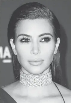  ??  ?? Kardashian arrives for the 2014 LACMA Art + Film Gala in Los Angeles on Nov 1, 2014. — AFP file photo