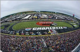  ?? MIKE MCCARN — THE ASSOCIATED PRESS ?? Charlotte Motor Speedway is the site of today’s NASCAR Cup Series race, the Coca-cola 600. Unlike years before, fans won’t be allowed into the race track because of the pandemic.