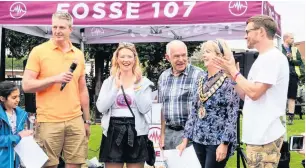  ??  ?? Katherine and Simon Tansey with R John Coward, left, assistant Town Centre Manager, and officials from Hinckley & Bosworth Borough Council. Right, Isla. Pictures: Nick Cooley