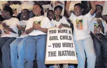  ?? ?? PEOPLE at a march against violence to women and children at the city hall in Johannesbu­rg. | KIM LUDBROOK