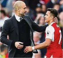  ??  ?? Please join us: Manchester City manager Pep Guardiola (left) is still hopeful of tempting Arsenal with a £20mil (RM113mil) offer for Alexis Sanchez before his deal runs out next summer. — Reuters