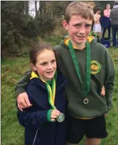  ??  ?? Kate and Neil Culhane at the Leinster Cross Country Championsh­ips in Navan.